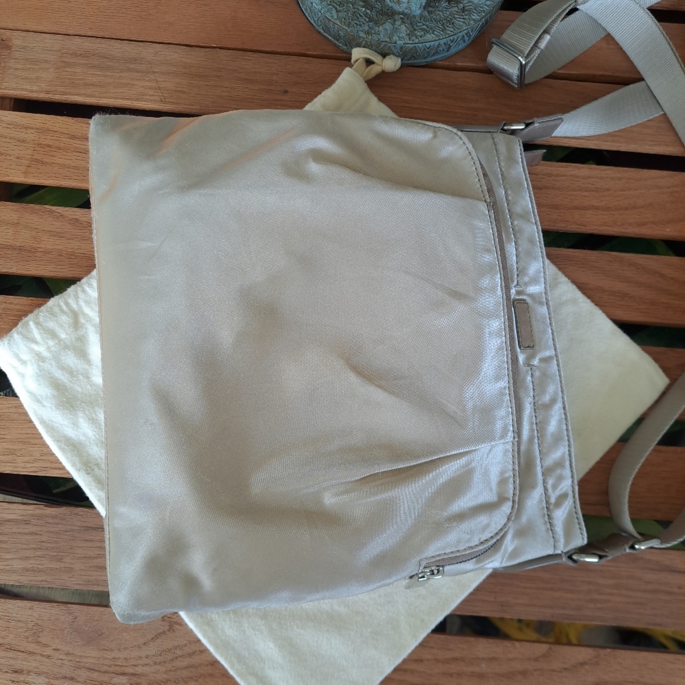 Tumi Creamy Metallic Shoulder / Crossbody Bag. Adjustable Strap.